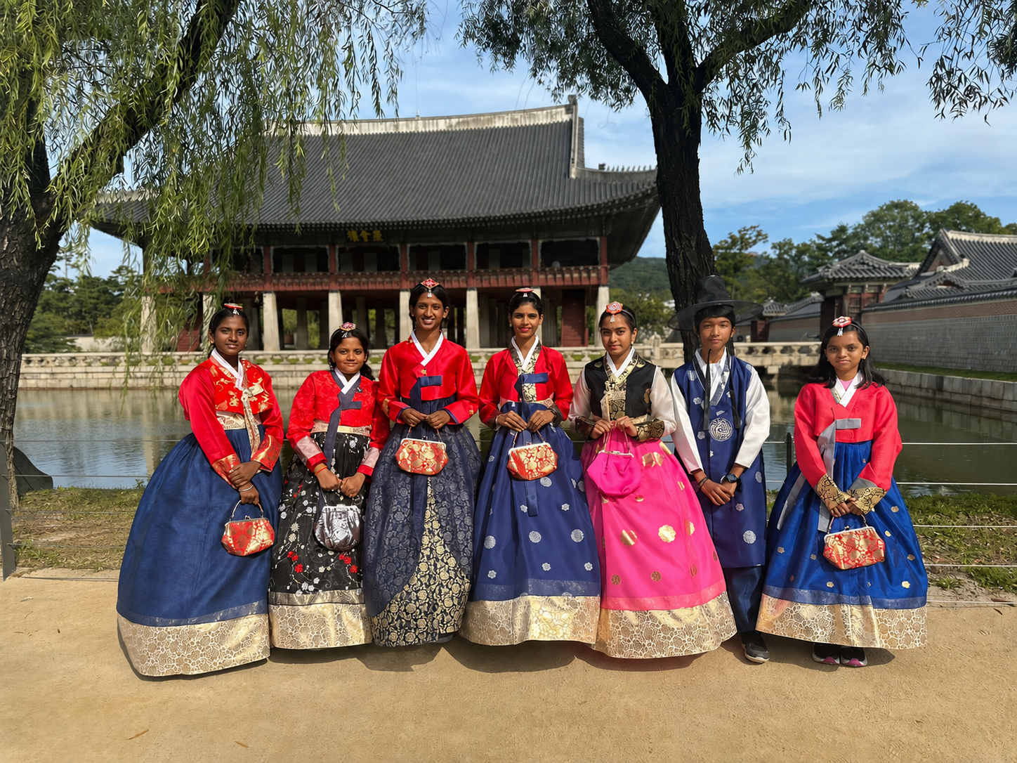 AWS students wearing Korean hanbok traditional dress at a palace
