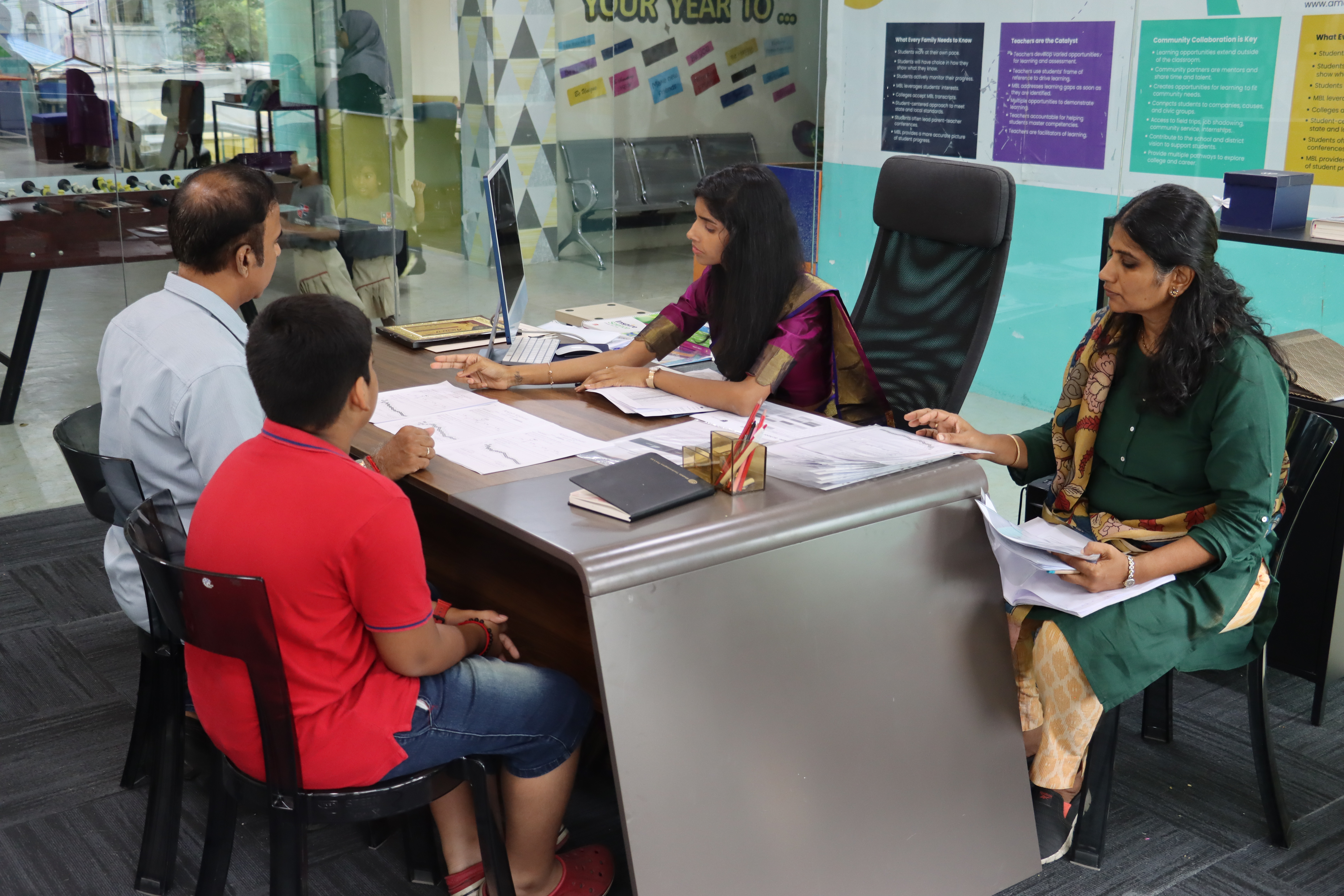 AWS counsellors meeting with a family about admission