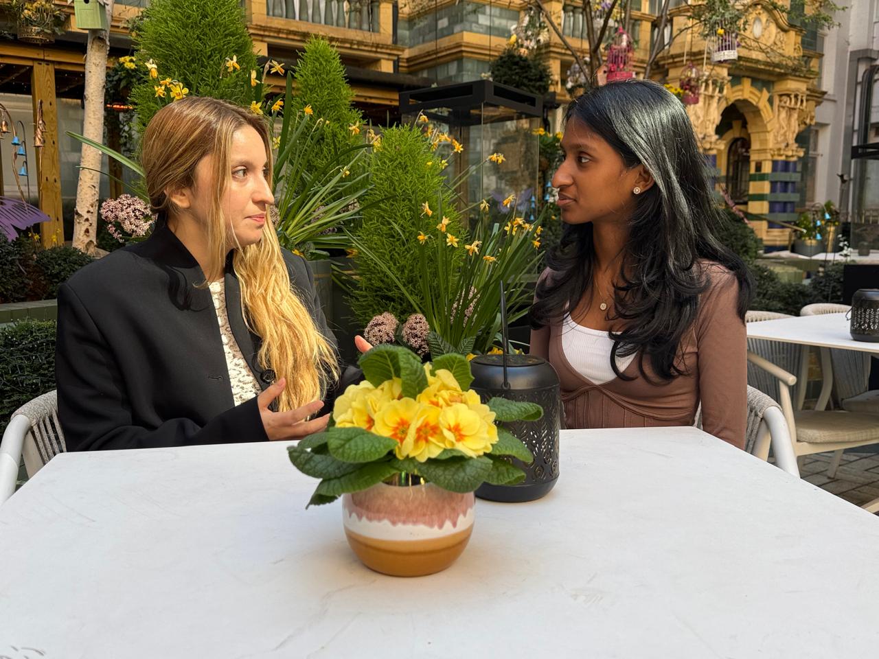 Founder Dr. Mohana Lakshmi in conversation with international partners in London